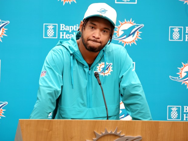 Miami Dolphins quarterback Tua Tagovailoa speaks after practice at the...