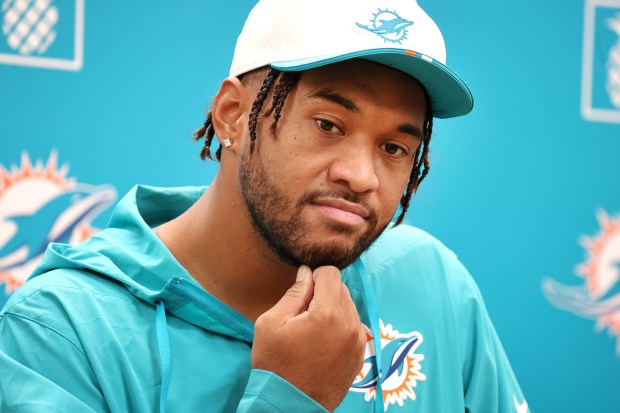 Miami Dolphins quarterback Tua Tagovailoa speaks after practice at the...