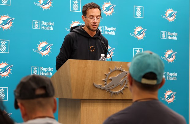 Miami Dolphins head coach Mike McDaniel speaks before practice at...