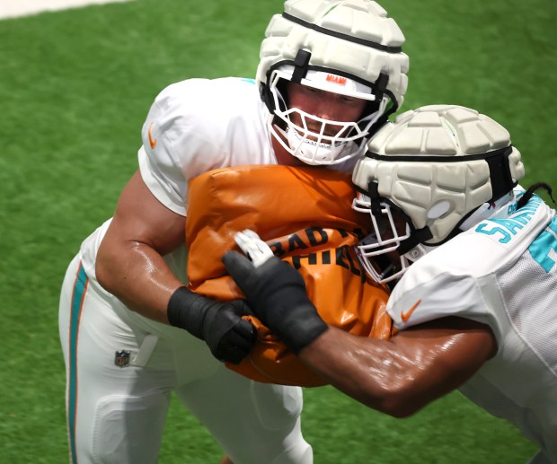 Miami Dolphins offensive lineman Cole Strange during practice at the...