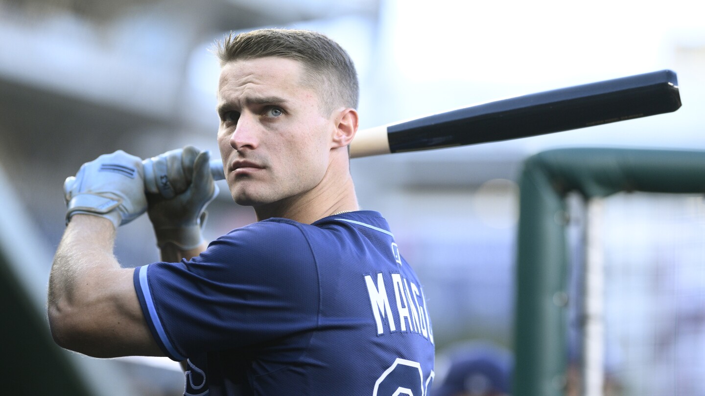 Rays rookie Jake Mangum enjoys seeing his father back at Soldier Field with former Bears teammates