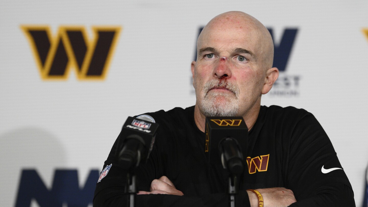 Commanders' Quinn bloodied in sideline collision with Mariota