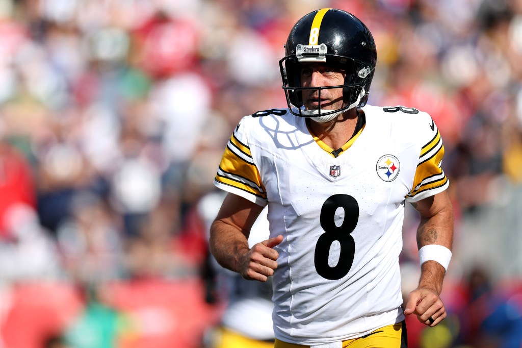 Pittsburgh Steelers player in a white and yellow jersey with number 8.