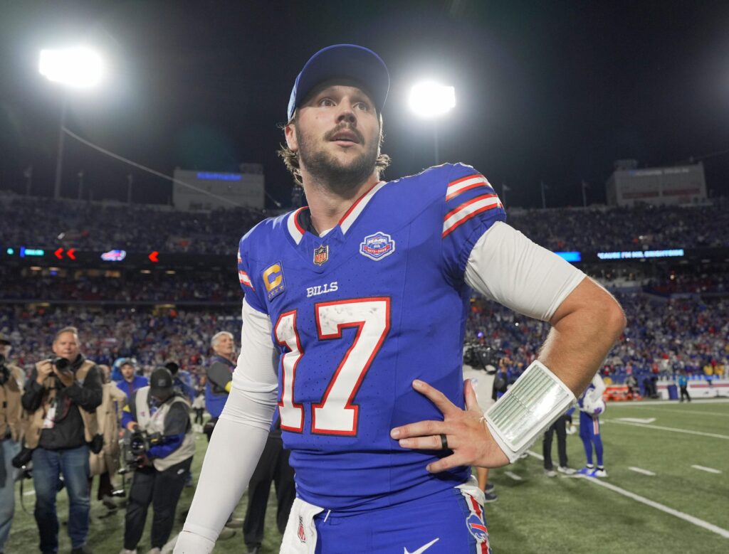 Buffalo Bills quarterback Josh Allen looks around the stadium after the game and their win against the Baltimore Ravens at Highmark Stadium in Orchard Park