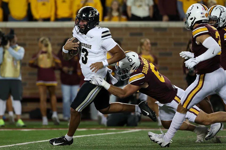 Purdue Boilermakers quarterback Malachi Singleton runs the ball for a touchdown against the Minnesota Golden Gophers on Saturday, Oct. 11, 2025, at Huntington Bank Stadium in Minneapolis.