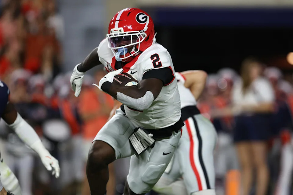 Oct 11, 2025; Auburn, Alabama, USA; Georgia Bulldogs running back Josh McCray (2) carries against the Auburn Tigers during the second quarter at Jordan-Hare Stadium. Mandatory Credit: John Reed-Imagn Images