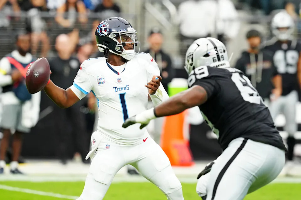 Oct 12, 2025; Paradise, Nevada, USA; Tennessee Titans quarterback Cam Ward (1) drops back to make a pass during the first half against the Las Vegas Raiders at Allegiant Stadium. Mandatory Credit: Stephen R. Sylvanie-Imagn Images