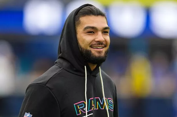 Puka Nacua watches LeBron James career highlights before an NFL game