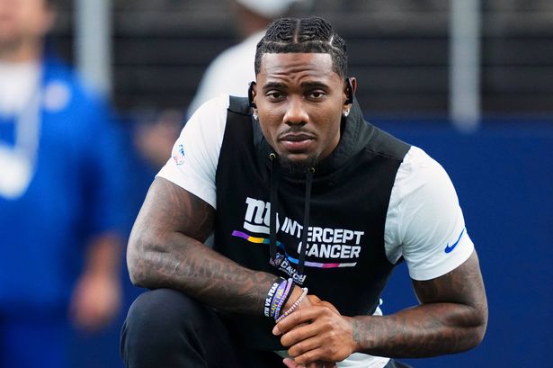 ARLINGTON, TX - SEPTEMBER 14: Malik Nabers #1 of the New York Giants warms up before kickoff against the Dallas Cowboys during an NFL football game at AT&T Field on September 14, 2025 in Arlington, Texas. (Photo by Cooper Neill/Getty Images)