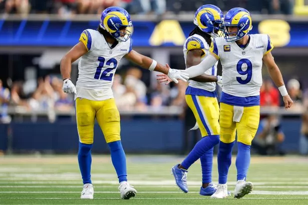 Puka Nacua #12 and Matthew Stafford #9 of the Los Angeles Rams celebrate after a first down in the fourth quarter of a game against the Houston Texans at SoFi Stadium on September 07, 2025 in Inglewood, California