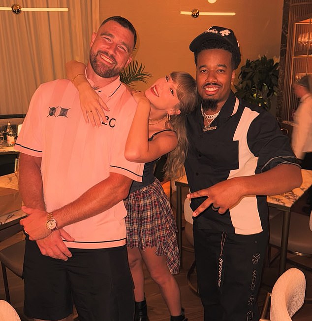 Travis Kelce and Taylor Swift pictured at his Kansas City restaurant on Sunday night