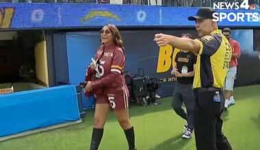 Regina Jackson, the agent and mother of NFL star Jayden Daniels, wore a custom outfit to her son's game against the Los Angeles Chargers this Sunday