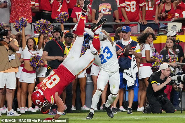 Kelce was dumped on his head as he rushed towards the end zone in the second quarter