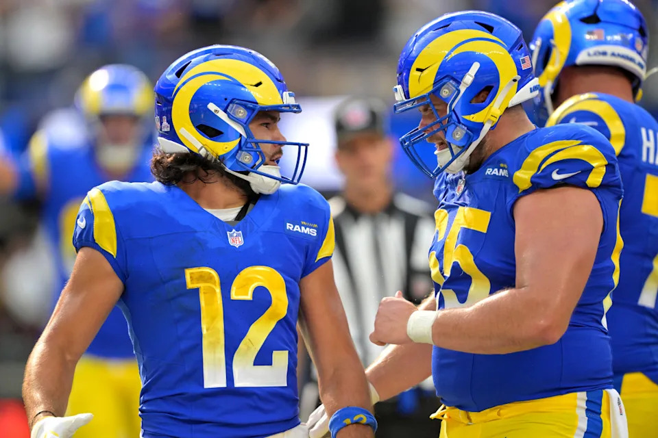 Sep 28, 2025; Inglewood, California, USA; Los Angeles Rams wide receiver Puka Nacua (12) is congratulated by center Coleman Shelton (65) after a touchdown in the second half at SoFi Stadium. Mandatory Credit: Jayne Kamin-Oncea-Imagn Images