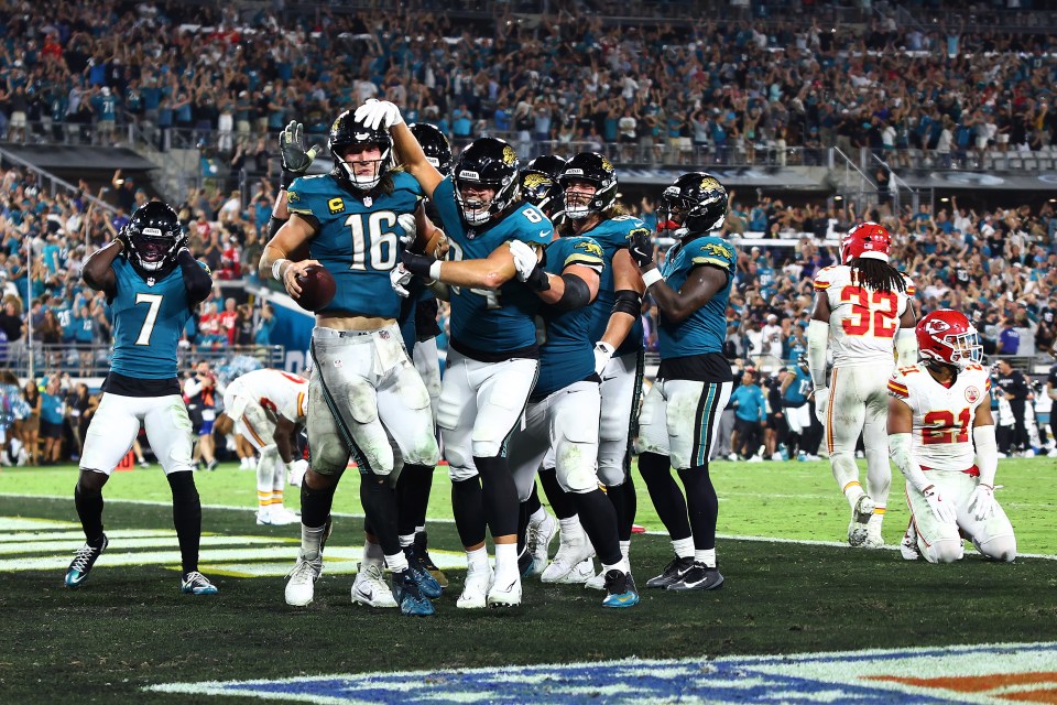 Trevor Lawrence #16 of the Jacksonville Jaguars celebrates a touchdown against the Kansas City Chiefs.