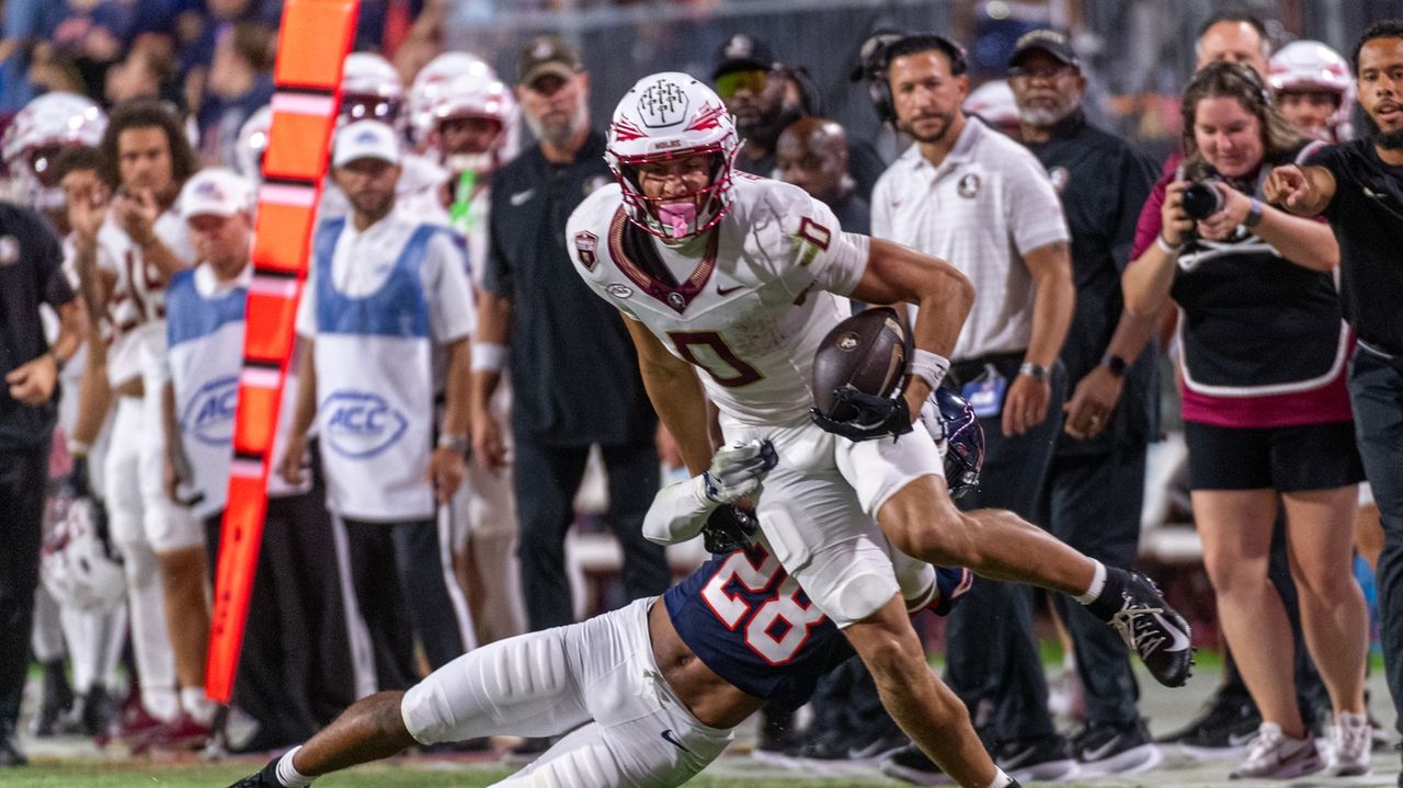 ACC bets on being 1st league in college football to bring TV viewers inside live replay reviews