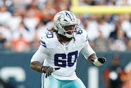 Dallas Cowboys offensive tackle Tyler Guyton (60) blocks during the second half of an NFL...