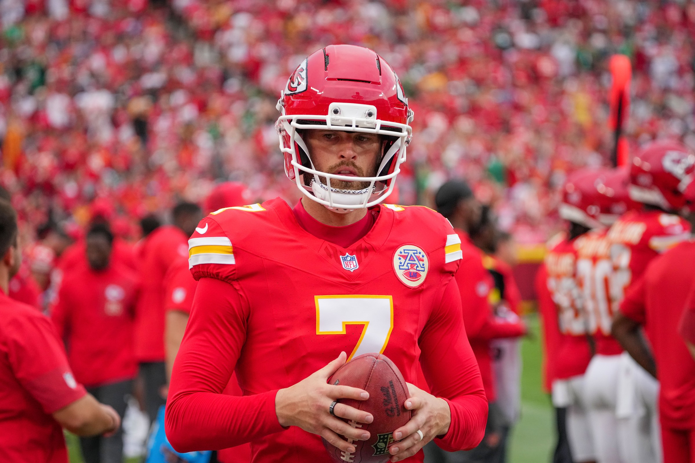 Sep 14, 2025; Kansas City, Missouri, USA; Kansas City Chiefs place kicker Harrison Butker (7) on the sidelines against the Philadelphia Eagles during the game at GEHA Field at Arrowhead Stadium. Mandatory Credit: Denny Medley-Imagn Images