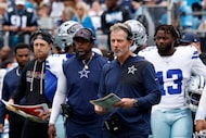 Dallas Cowboys defensive coordinator Matt Eberflus, second from right, in the second half of...