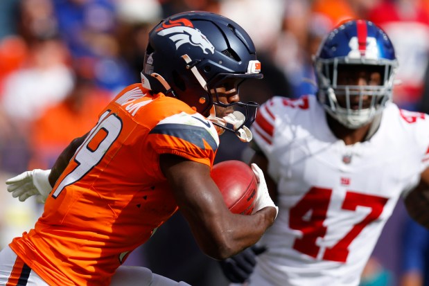 Marvin Mims Jr. #19 of the Denver Broncos returns a punt during the first quarter against the New York Giants at Empower Field At Mile High on Oct. 19, 2025 in Denver. (Photo by Justin Edmonds/Getty Images)