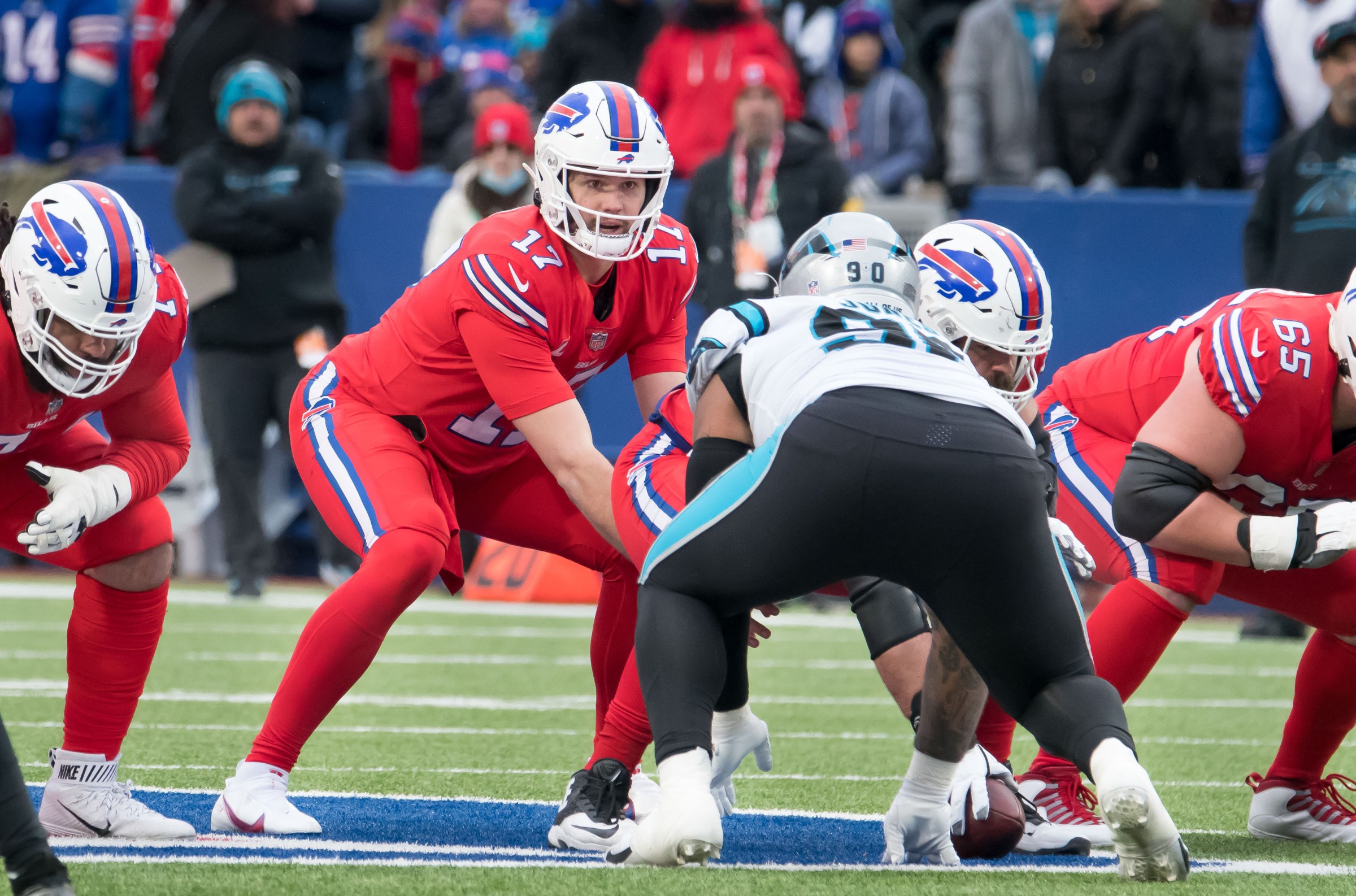 Dec 19, 2021; Orchard Park, New York, USA; Buffalo Bills quarterback Josh Allen (17) at the line of scrimmage against the Carolina Panthers at Highmark Stadium. Mandatory Credit: Mark Konezny-Imagn Images