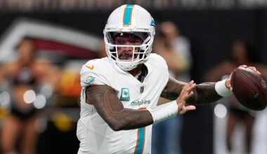 Dolphins' Tua Tagovailoa battles illness to throw 4 TDs vs Falcons
