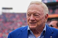 Dallas Cowboys owner Jerry Jones looks on against the Denver Broncos before an NFL football...