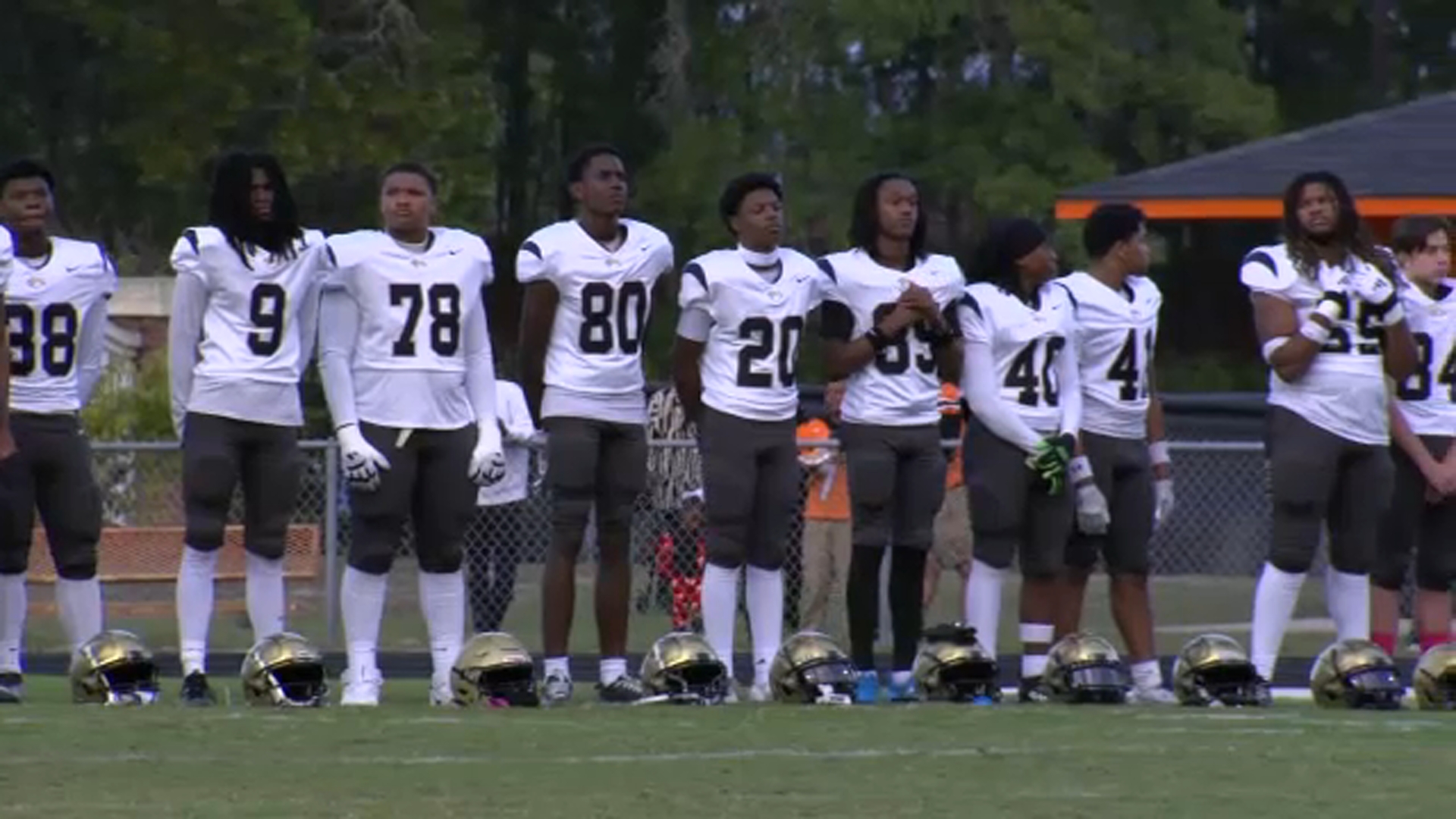 E.E. Smith players are seen during a pregame tribute Tuesday.