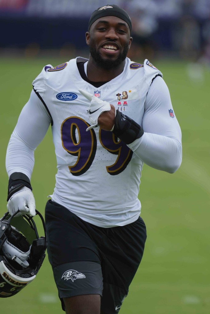 Baltimore Ravens linebacker Odafe Oweh (99) comes onto the field during training camp at the Under Armour Performance Center.
