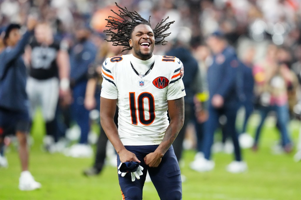 Darnell Mooney, number 10 for the Chicago Bears, celebrates on the field.