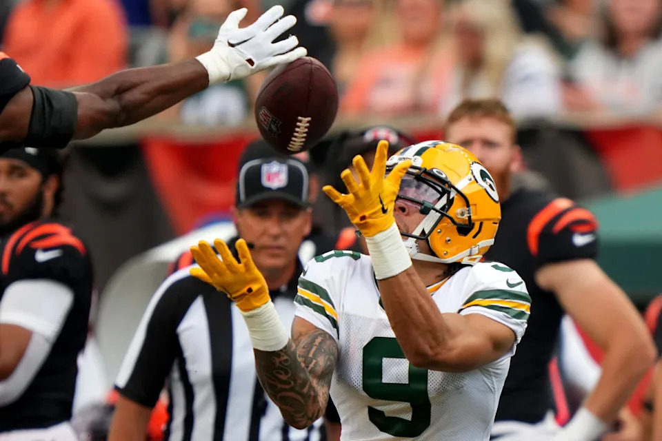 Cincinnati Bengals safety Dax Hill (23) breaks up a pass intended for Green Bay Packers wide receiver Christian Watson (9) in the first quarter during a Week 1 NFL preseason game between the Green Bay Packers and the Cincinnati Bengals,Friday, Aug. 11, 2023, at Paycor Stadium in Cincinnati.