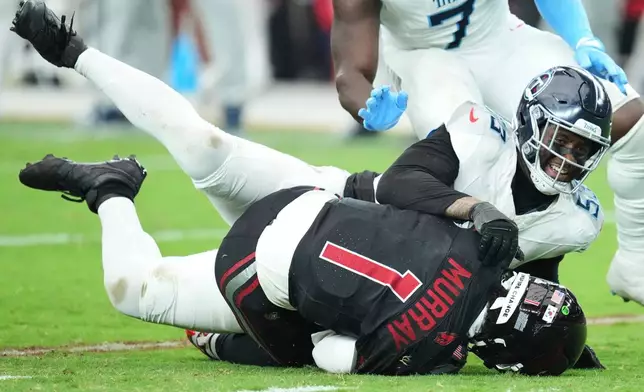 Tennessee Titans linebacker Jihad Ward (53) sacks Arizona Cardinals quarterback Kyler Murray (1) during the second half of an NFL football game Sunday, Oct. 5, 2025, in Glendale, Ariz. (AP Photo/Ross D. Franklin)