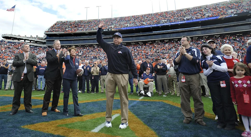 Samford coach and Auburn Heisman Trophy winner Pat Sullivan waves to the crowd before the Auburn vs. Samford game in Auburn, Ala. on Saturday November 19, 2011.(Montgomery Advertiser, Mickey Welsh)