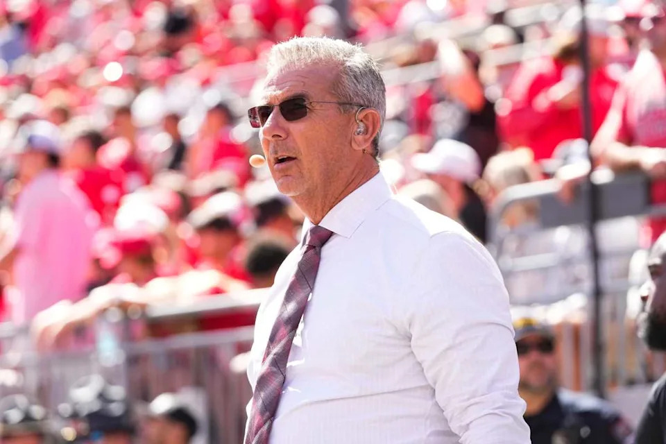 Former Ohio State Buckeyes head coach Urban Meyer, now with Fox Sports, watches on the sideline during the NCAA football game against the Texas Longhorns at Ohio Stadium on Aug. 30, 2025.© Adam Cairns/Columbus Dispatch / USA TODAY NETWORK via Imagn Images