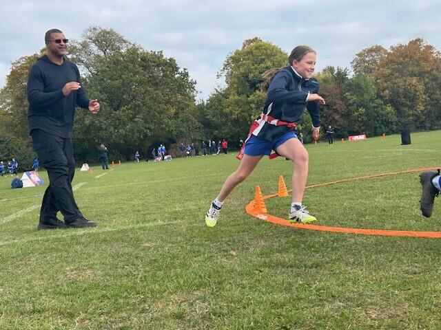 Broncos host flag football clinic at London-area middle school ahead of game
