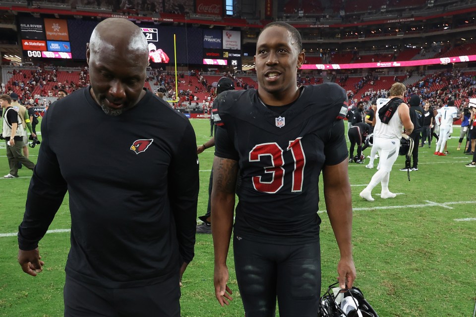 A picture of Emari Demercado walking off the field 