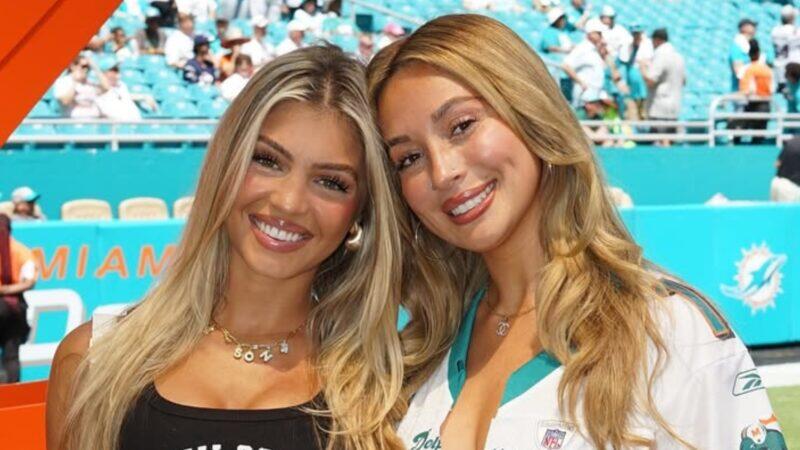 Zach Wilson’s Fiancée Nicolette & Dolphins WAGs Go Viral in Jersey-Dress Outfits at Game [PHOTOS]
