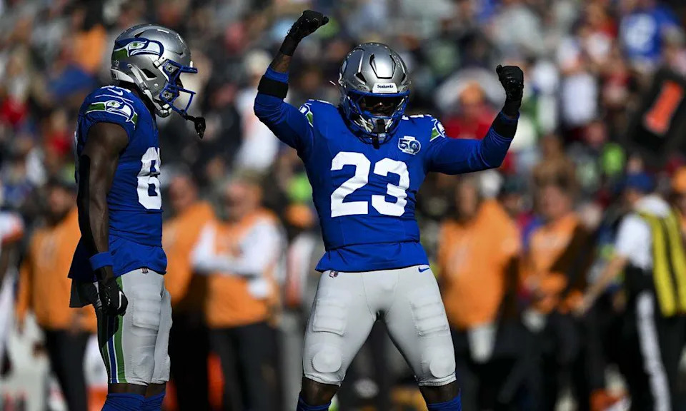 Seattle Seahawks safety D'Anthony Bell (23) reacts to a big hit on a kick against the Tampa Bay Buccaneers return during the third quarter of the game at Lumen Field, on Sunday, Oct. 5, 2025, in Seattle. Brian Hayes/bhayes@thenewstribune.com