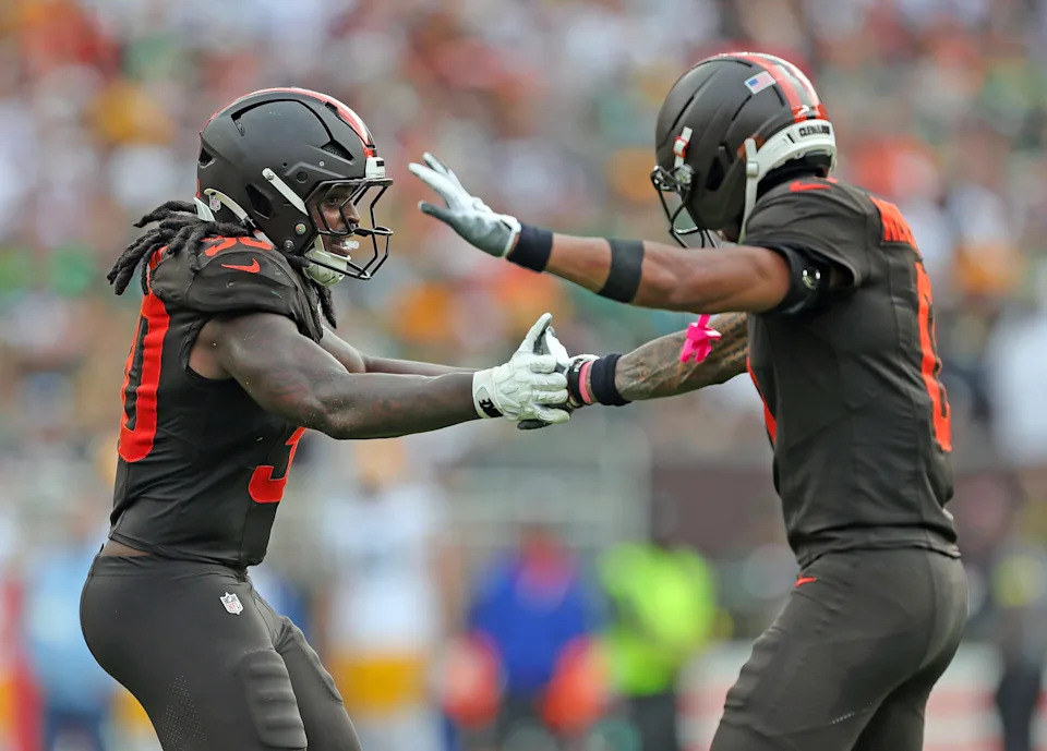 Cleveland Browns linebacker Devin Bush (30) celebrates with Greg Newsome II during the second half of an NFL football game at Huntington Bank Field, Sept. 21, 2025, in Cleveland, Ohio.