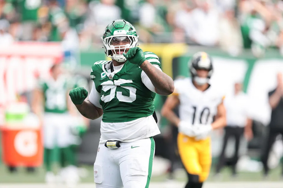 Sep 7, 2025; East Rutherford, New Jersey, USA; New York Jets defensive tackle Quinnen Williams (95) celebrates a defensive stop during the fourth quarter against the Pittsburgh Steelers at MetLife Stadium. Mandatory Credit: Vincent Carchietta-Imagn Images