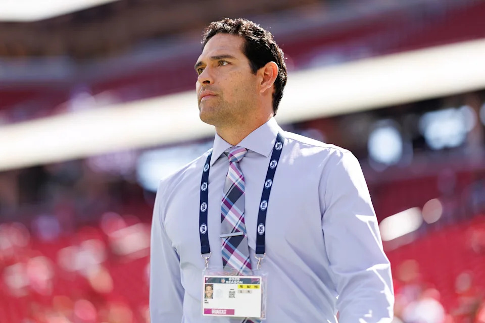 Brooke Sutton/Getty Images - PHOTO: NFL broadcaster Mark Sanchez stands on the field prior to an NFL football game between the Arizona Cardinals and the San Francisco 49ers at Levi's Stadium, on Sept. 21, 2025, in Santa Clara, Calif.