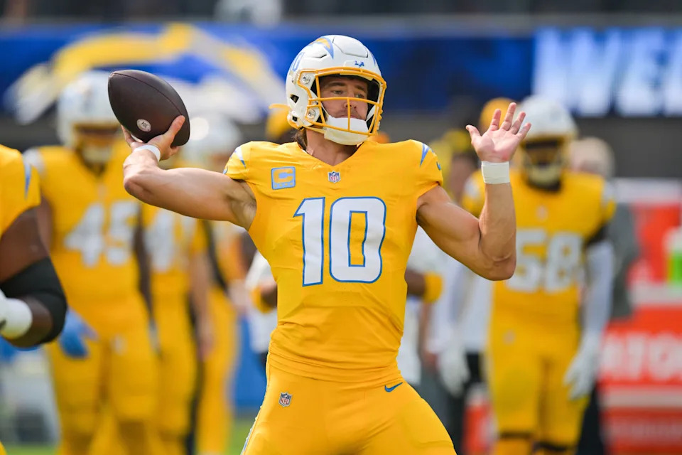 Oct 19, 2025; Inglewood, California, USA; Los Angeles Chargers quarterback Justin Herbert (10) warms up prior to the game against the Indianapolis Colts at SoFi Stadium.