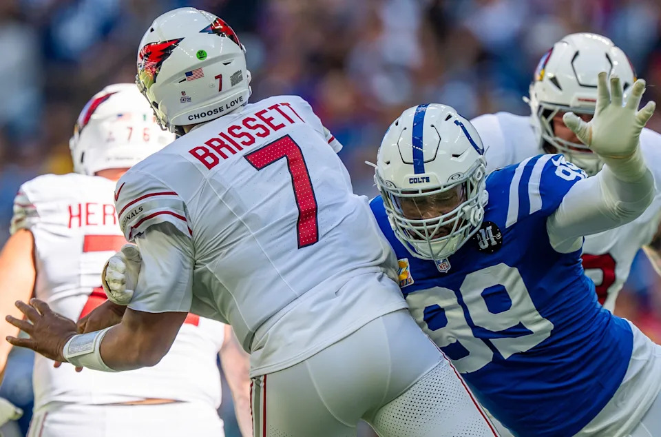 Indianapolis Colts defensive tackle Deforest Buckner (99) pressures Arizona Cardinals quarterback Jacoby Brissett (7) on Sunday, Oct. 12, 2025, at Lucas Oil Stadium in Indianapolis.