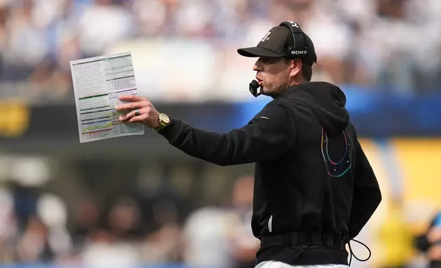 Indianapolis Colts head coach Shane Steichen on the sideline during the first half of an NFL football game against the Los Angeles Chargers Sunday, Oct. 19, 2025, in Inglewood, Calif. (AP Photo/Gregory Bull)