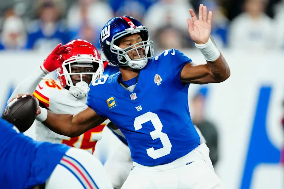 New York Giants quarterback Russell Wilson (3) passes to a teammate before Kansas City Chiefs cornerback Jaylen Watson (35) can get to him, Sunday, September 21, 2025.