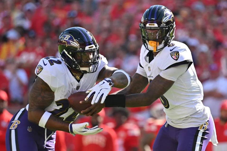 Lamar Jackson hands off to Derrick Henry of the Baltimore Ravens during the first half against the Kansas City Chiefs at Arrowhead Stadium on September 28, 2025 in Kansas City, Missouri. Getty Images