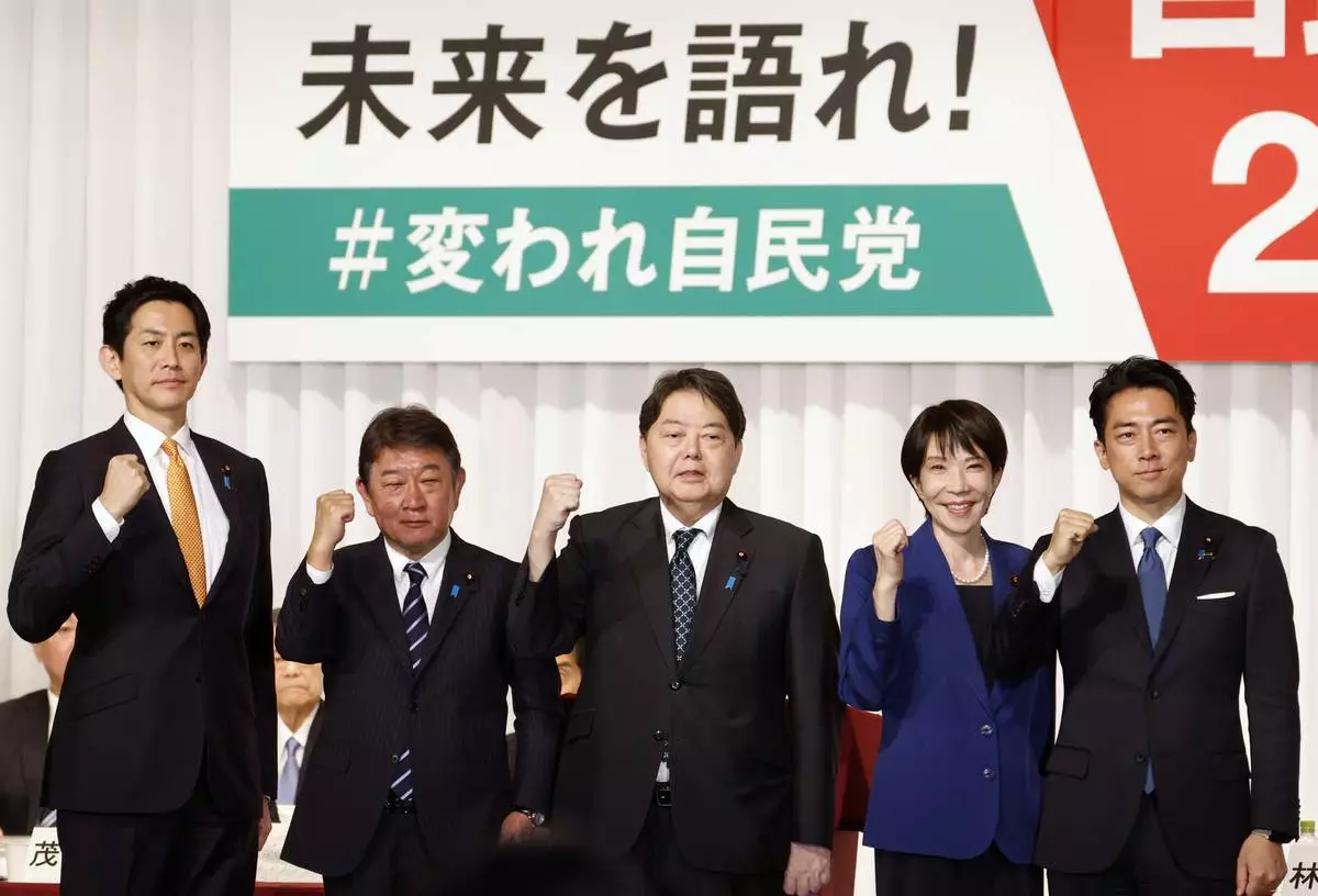 From left, Japan's former Economic Security Minister Takayuki Kobayashi, former Foreign Minister Toshimitsu Motegi, chief Cabinet Secretary Yoshimasa Hayashi, former Economic Security Minister Sanae Takaichi and Agriculture Minister Shinjiro Koizumi pose after they delivered speeches at the kick-off of the campaign for the Liberal Democratic Party's presidential election in Tokyo, Monday, Sept. 22, 2025. (Franck Robichon/Pool Photo via AP)