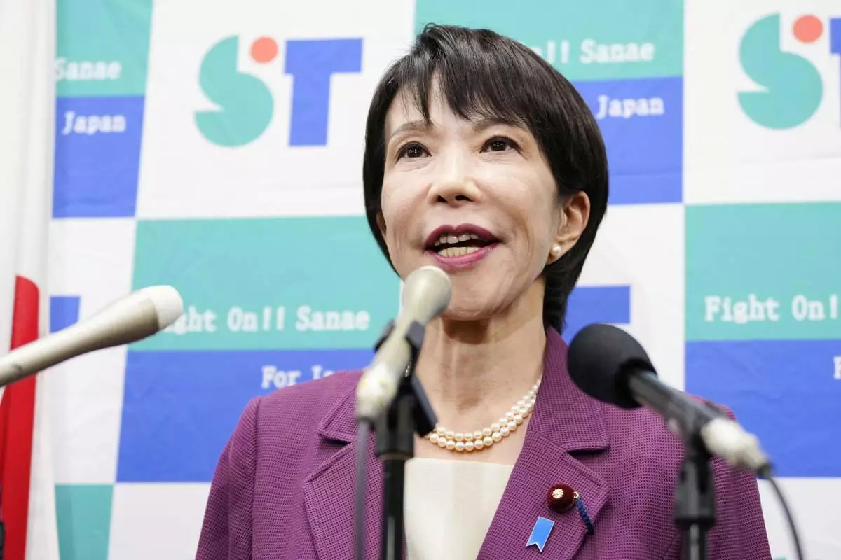 Japan's Former Economic Security Minister Sanae Takaichi speaks to the media regarding the upcoming upcoming ruling Liberal Democratic Party's leadership election, at parliament in Tokyo, on Sept. 18, 2025. (Yohei Fukai/Kyodo News via AP)