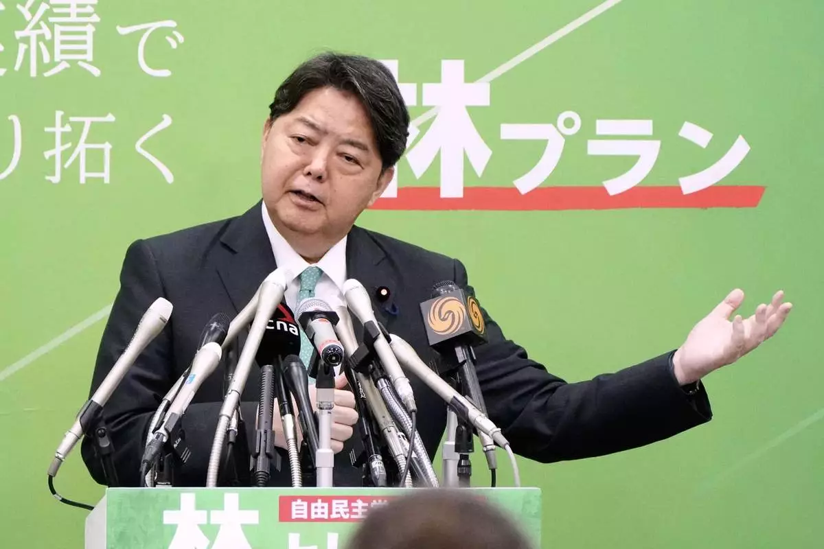 Japan's Chief Cabinet Secretary Yoshimasa Hayashi announces his bid to run in the upcoming ruling Liberal Democratic Party's leadership election, at parliament in Tokyo, on Sept. 18, 2025. (Keisuke Hosojima/Kyodo News via AP)