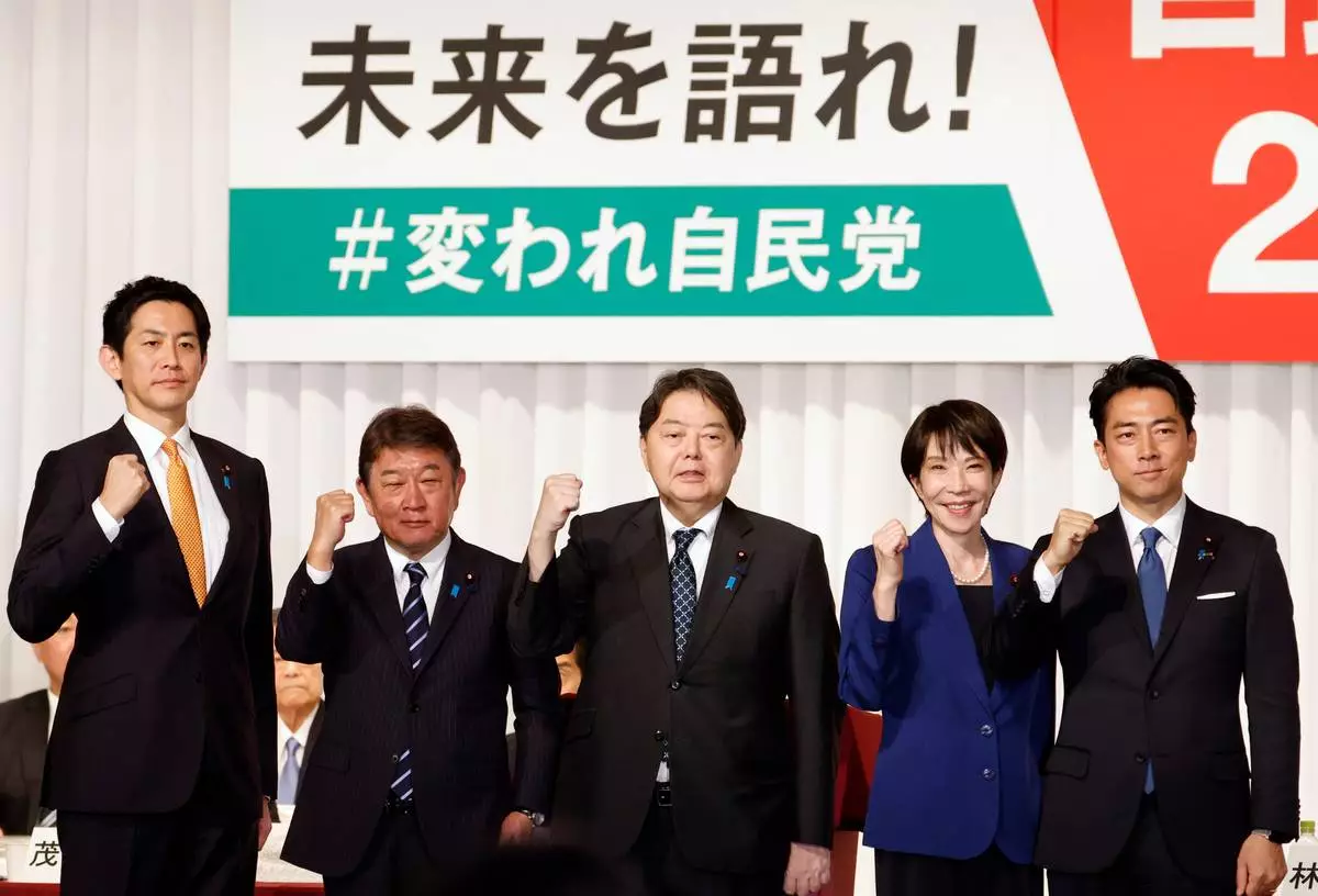 FILE - From left, Japan's former Economic Security Minister Takayuki Kobayashi, former Foreign Minister Toshimitsu Motegi, chief Cabinet Secretary Yoshimasa Hayashi, former Economic Security Minister Sanae Takaichi and Agriculture Minister Shinjiro Koizumi pose after they delivered speeches at the kick-off of the campaign for the Liberal Democratic Party's presidential election in Tokyo, on Sept. 22, 2025. (Franck Robichon/Pool Photo via AP, File)
